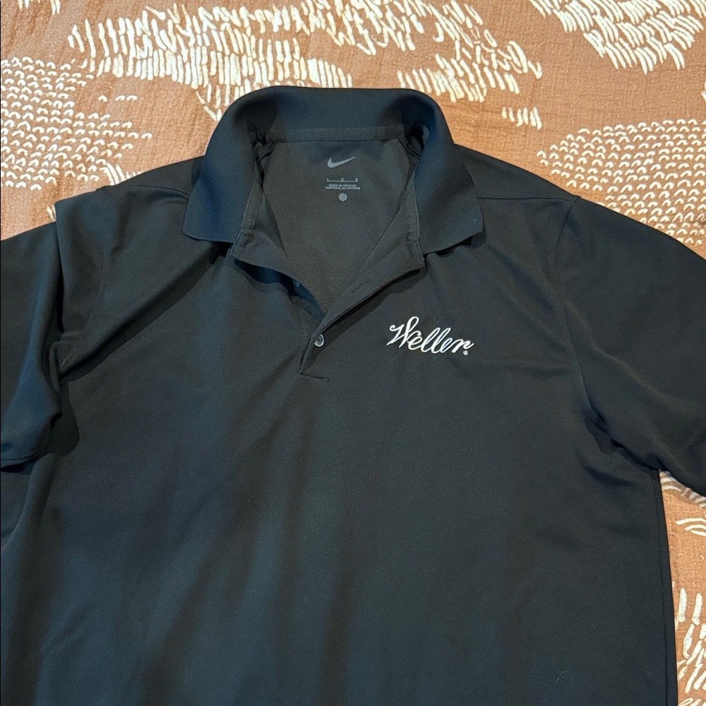 Nike Men's Black Polo with White Logo